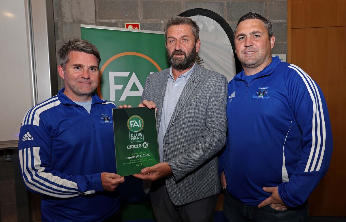 John Finnegan, Vice President FAI presents Colin Yelverton and James Fogarty, Leeds AFC Cork with their award. Picture: Jim Coughlan. John Finnegan, Vice President FAI presents Colin Yelverton and James Fogarty, Leeds AFC Cork with their award. Picture: Jim Coughlan.
