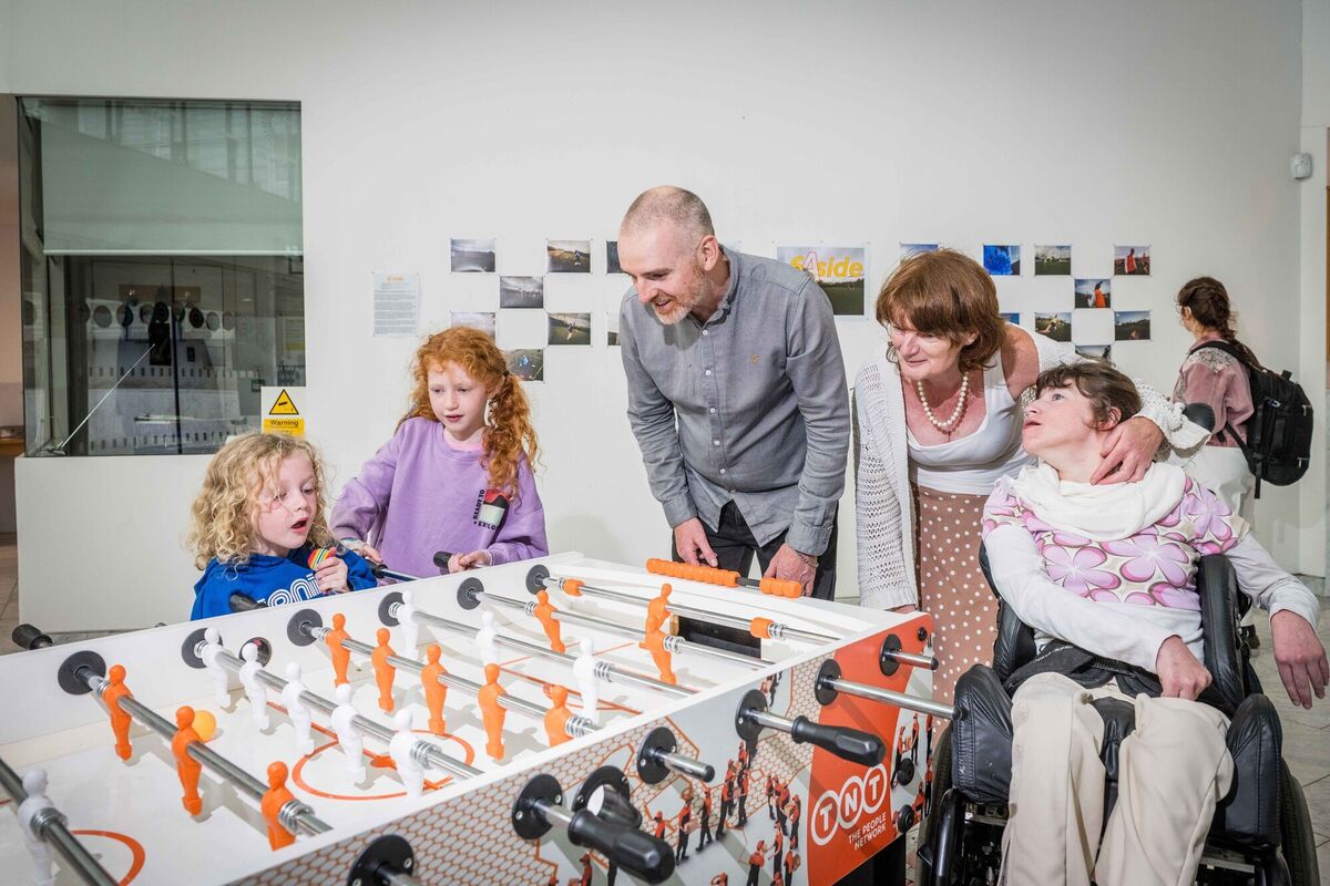 Photographer Paul O’Carroll (centre) at his 6-A-Side exhibition at Cork City Hall with Penny and Darragh Long and Trish and Tara Conroy, at Culture Night 2024. Picture: Joleen Cronin Photographer Paul O’Carroll (centre) at his 6-A-Side exhibition at Cork City Hall with Penny and Darragh Long and Trish and Tara Conroy, at Culture Night 2024. Picture: Joleen Cronin