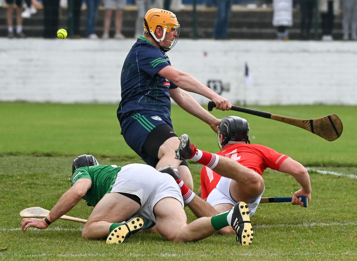  Blarney's Padraig Power flicks the ball to the Killeagh net despite the efforts of Philip O'Neill and Alan Keniry, during their Senior AHC quarter-final at Midleton. Picture: David Keane.