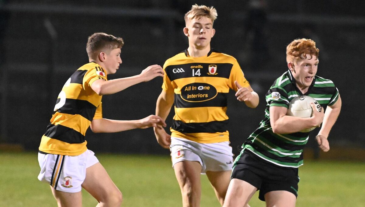 Douglas' Diarmuid O'Donoghue goes past Na Piarsaigh's Luke Hurley and Ryan Manley during the Rebel Óg Premier 1 U16 FC final. Picture: Eddie O'Hare