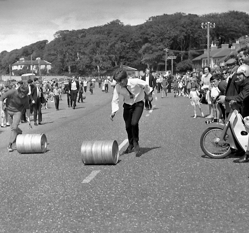 Rolling the barrel at Whitegate Festival, Co. Cork, in August, 1970. A Throwback Thursday reader worked in a pub there in the 1960s. Rolling the barrel at Whitegate Festival, Co. Cork, in August, 1970. A Throwback Thursday reader worked in a pub there in the 1960s.