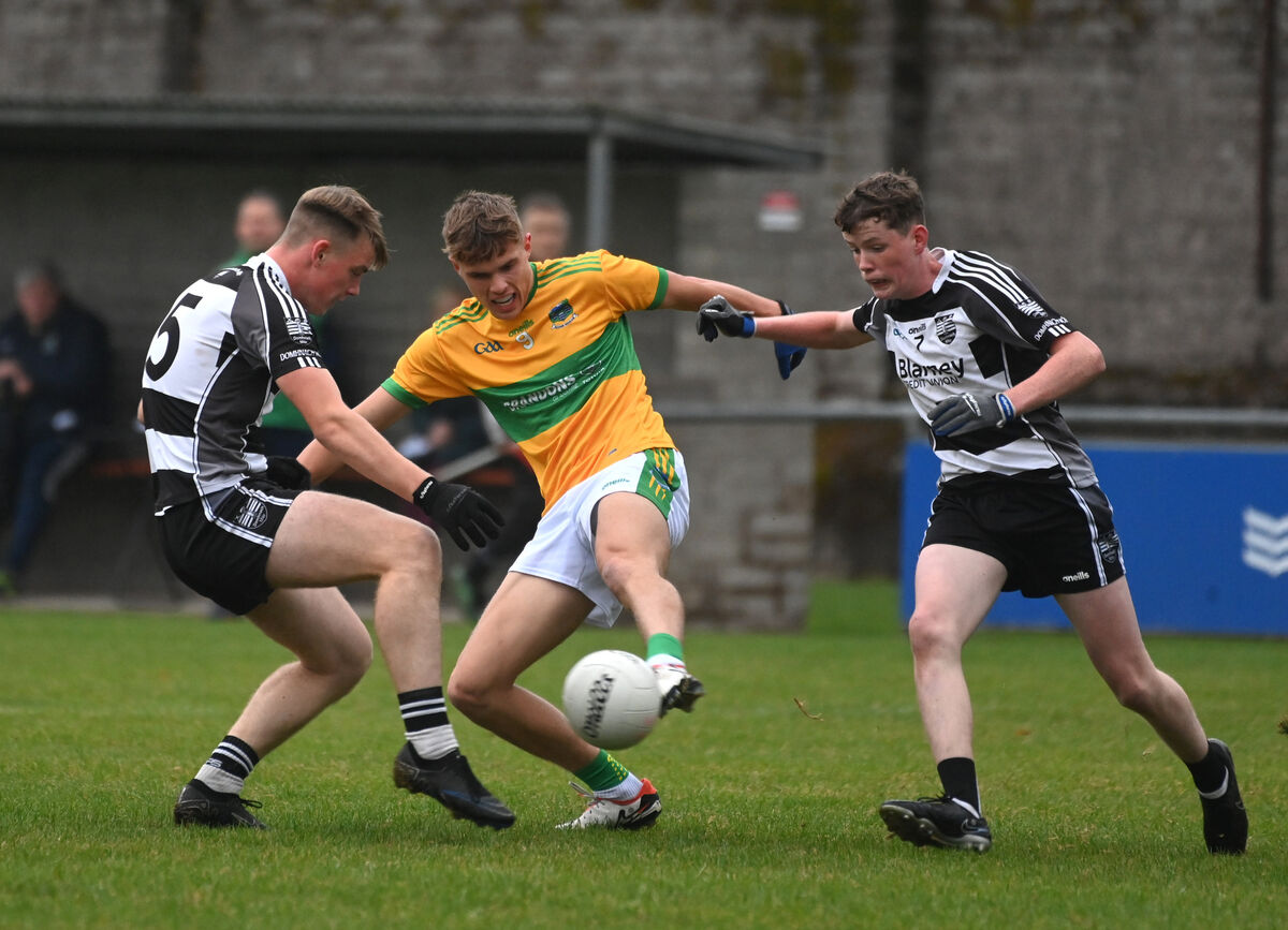 Donoughmore defenders Liam O'Sullivan and Jack Murphy close down Harry Cogan, Glanmire. Picture: Larry Cummins  Donoughmore defenders Liam O'Sullivan and Jack Murphy close down Harry Cogan, Glanmire. Picture: Larry Cummins