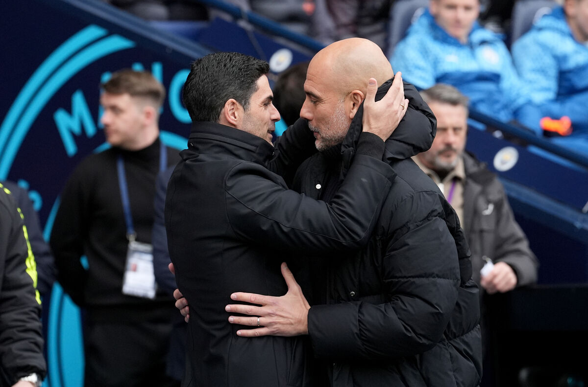 Manchester City manager Pep Guardiola and Arsenal manager Mikel Arteta speak ahead of the Premier League match at the Etihad Stadium, Manchester.