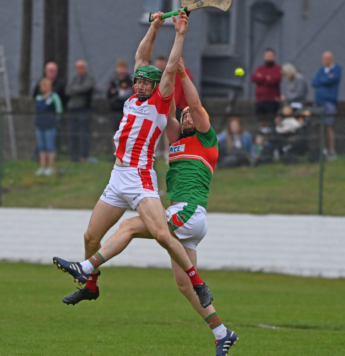 Imokilly's Seamus Harnedy goes high with Fr. O'Neill's Mark O'Keeffe. Picture: Eddie O'Hare