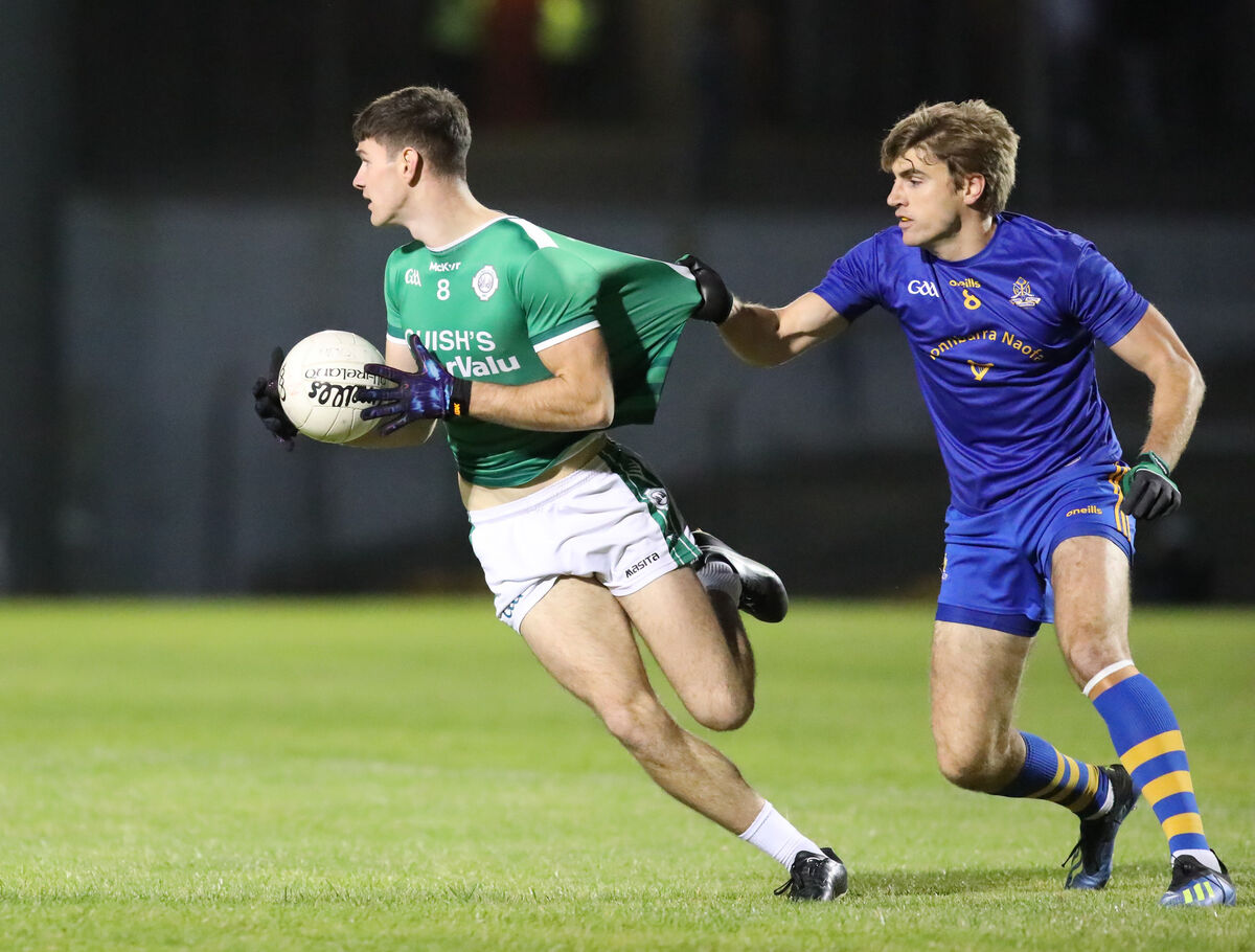 Ballincollig's Seán Dore is pulled back by St Finbarr's Ian Maguire. Picture: David Creedon Ballincollig's Seán Dore is pulled back by St Finbarr's Ian Maguire. Picture: David Creedon