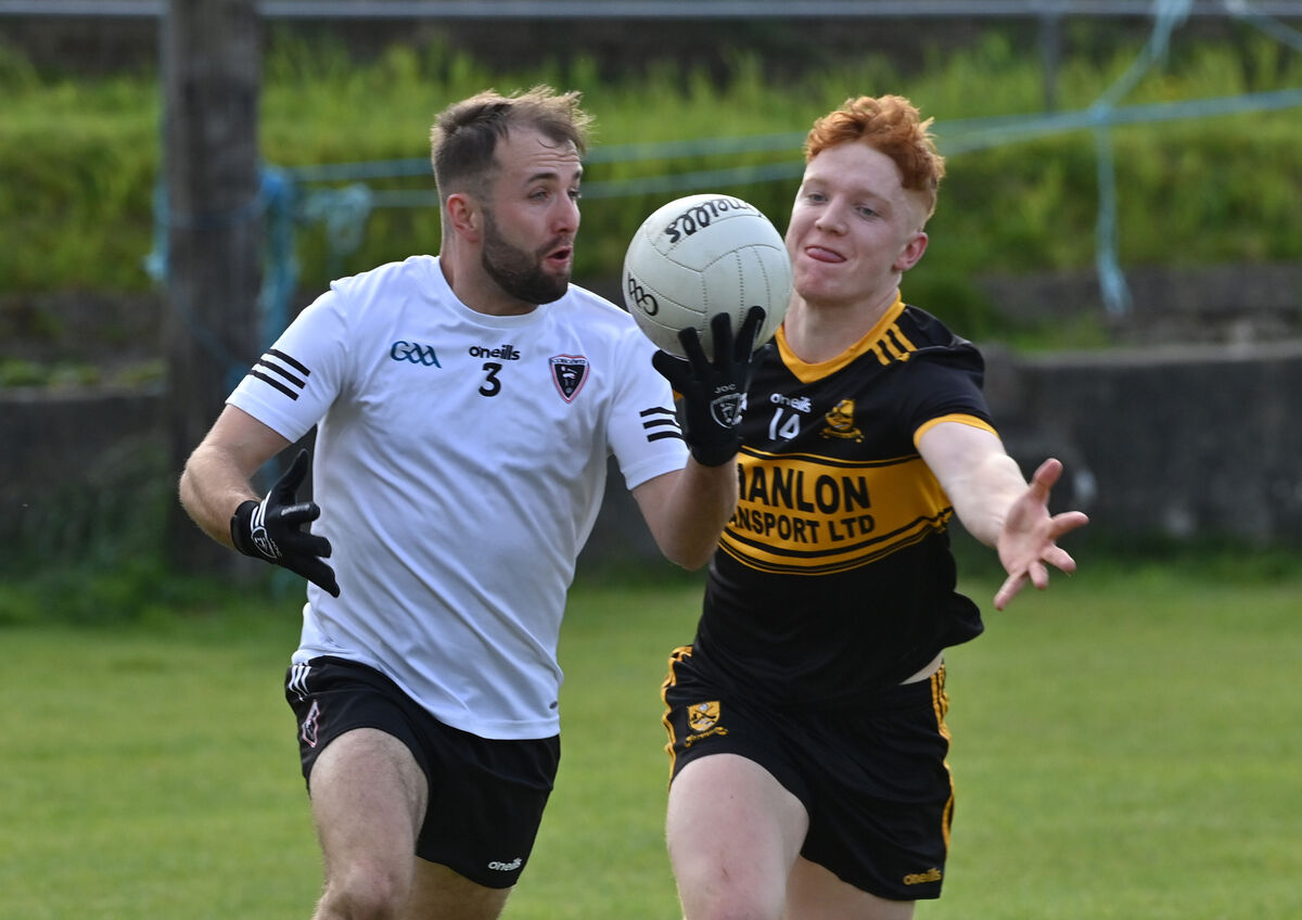  Clyda Rovers' Eoin Walsh looks to challenge Kiskeam's Jack O'Connor. Picture: Dan Linehan