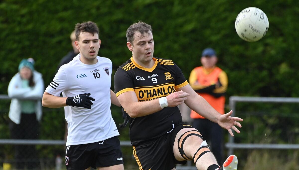 Conor Flanagan of Clyda Rovers makes a pass, shadowed by Eoghan Daly of Kiskeam. Picture: Dan Linehan Conor Flanagan of Clyda Rovers makes a pass, shadowed by Eoghan Daly of Kiskeam. Picture: Dan Linehan