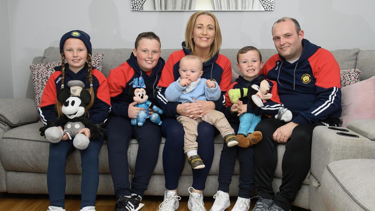 Seven-year-old Zac Higgins who was injured in a hit and run when he was three was nominated by the Cork City Hospitals Children' Club to go to Disneyland Paris with his family. Included are Belle, Max, Noah and parents Aisling and Paul Higgins. Picture Dan Linehan