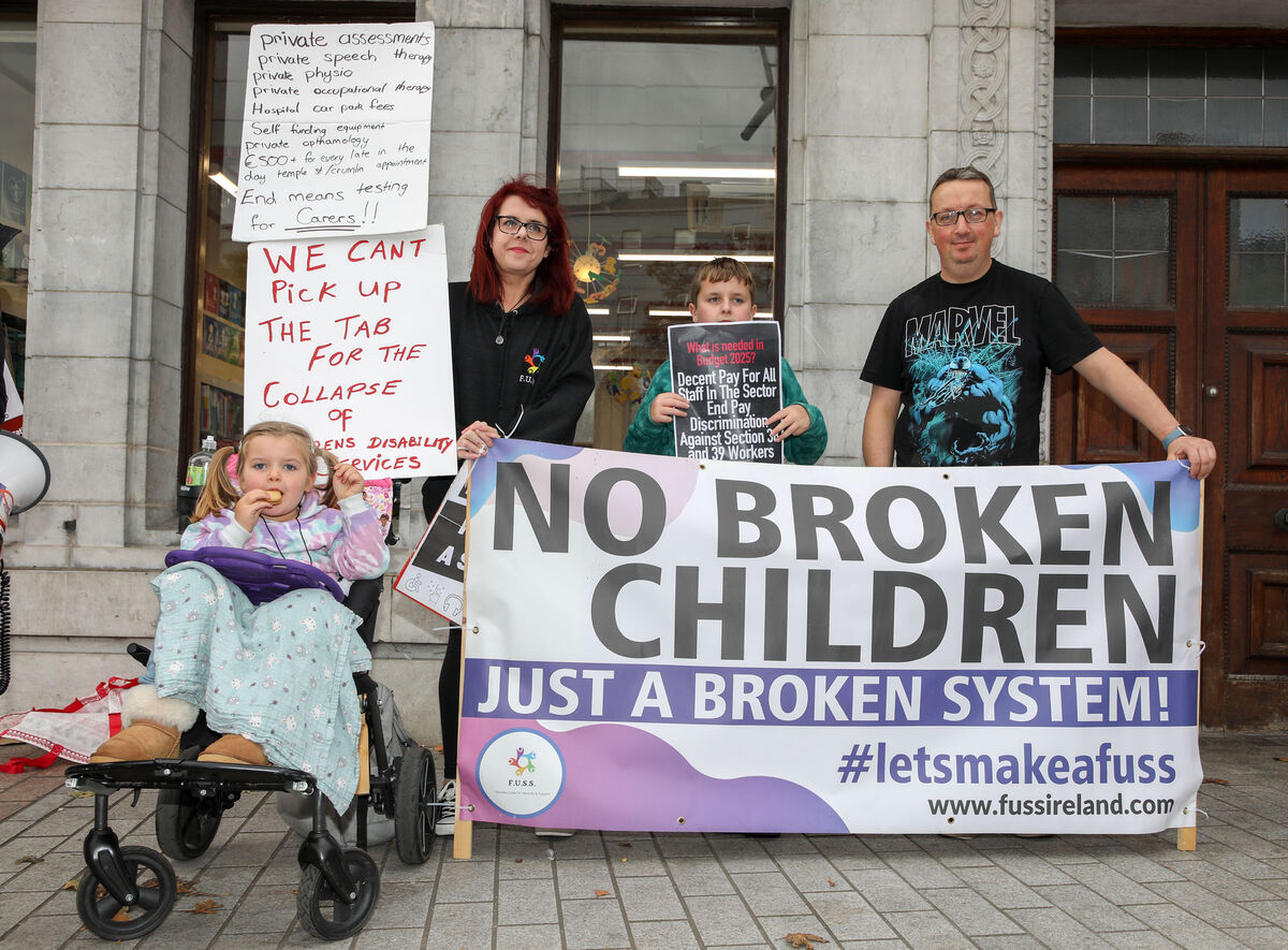 Emmelline, Rebecca, Noah and Ger O'Riordan at a pre-budget protest meeting against underfunding of disability and autism services that was held on Grand Parade, Cork. - Picture: David Creedon