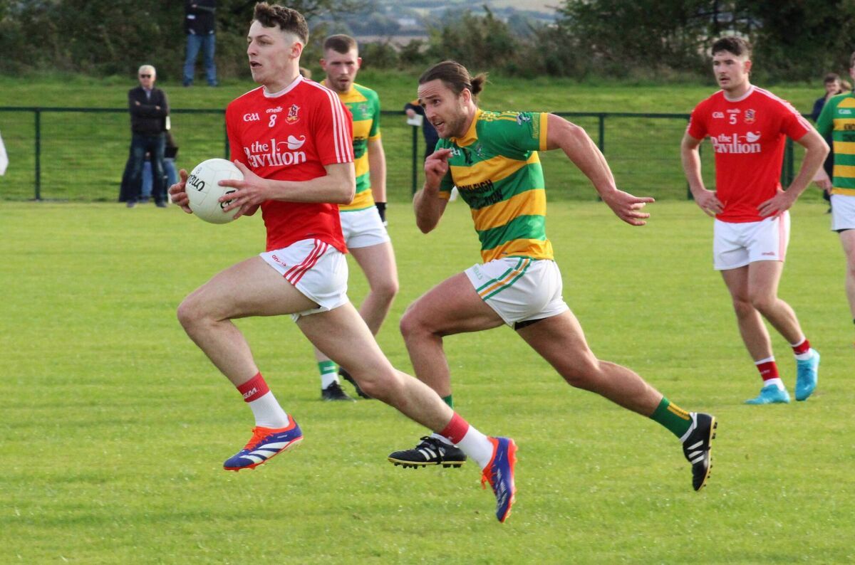 Jamie Fenton of Ballygarvan tries to get away from Ballymartle's Rickard Cahalane in the Carrigdhoun JAFC semi-final. Picture: Delores Kidney Jamie Fenton of Ballygarvan tries to get away from Ballymartle's Rickard Cahalane in the Carrigdhoun JAFC semi-final. Picture: Delores Kidney