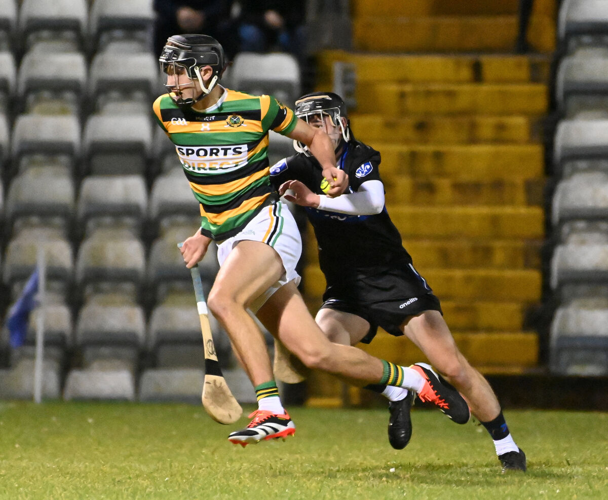 Glen Rovers' Michael T Brosnan is tackled by Sarsfields' Adam Leahy. Picture: Eddie O'Hare
