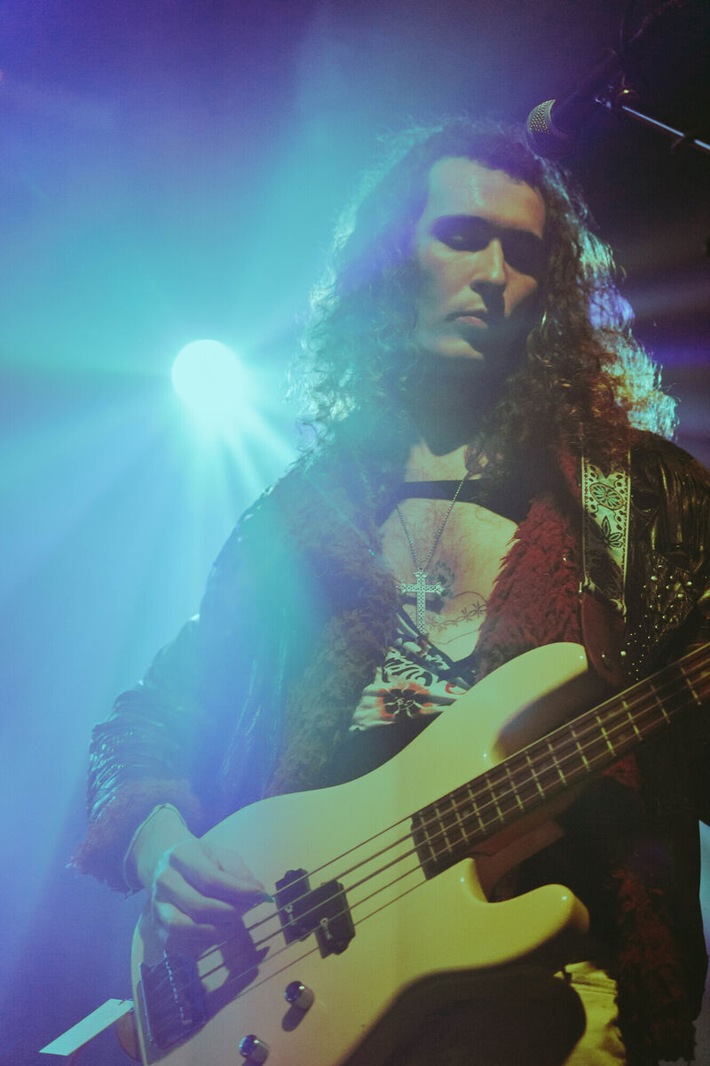 The Love Buzz' bassist Aidan Lynch grabs attention on stage at Cyprus Avenue.
