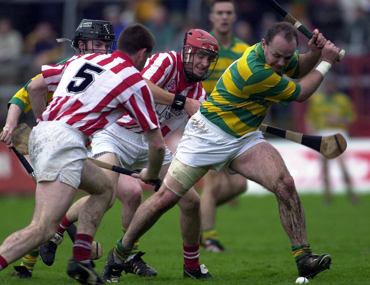 Blackrock's Liam Meaney strikes past Imokilly's Mark Landers in the Cork SHC final in 2001. Picture: Des Barry Blackrock's Liam Meaney strikes past Imokilly's Mark Landers in the Cork SHC final in 2001. Picture: Des Barry