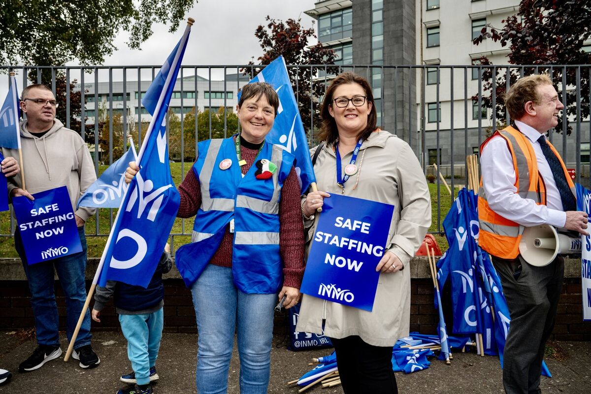 INMO members Lynda Moore and Ester Fitzgerald pictured outside CUH where there were among a large number of people who staged a protest on staffing shortages and the impact of the recruitment freeze. Picture: Chani Anderson INMO members Lynda Moore and Ester Fitzgerald pictured outside CUH where there were among a large number of people who staged a protest on staffing shortages and the impact of the recruitment freeze. Picture: Chani Anderson