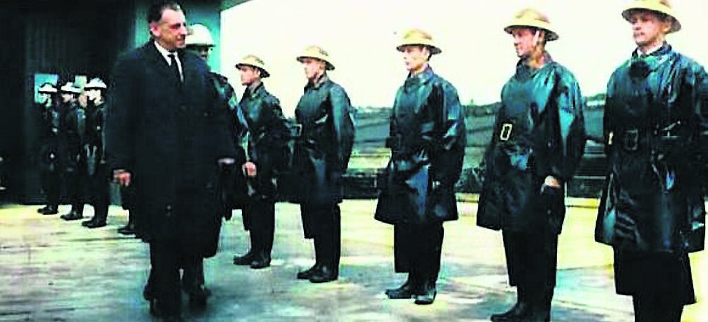 Taoiseach Seán Lemass inspects a Guard of Honour drawn from the Works Fire Brigade, accompanied by fire officer Jack Manning, at the official opening of the new extension on April 18, 1963. On right is Seán Kenefick. Taoiseach Seán Lemass inspects a Guard of Honour drawn from the Works Fire Brigade, accompanied by fire officer Jack Manning, at the official opening of the new extension on April 18, 1963. On right is Seán Kenefick.