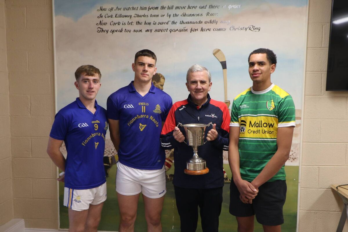 Michael O'Mahony, chairman of Rebel Óg with St Finbarr's Aaron Kennedy, Rickey Barrett, captain and Shandrum vice-captain Johnny Murphy ahead of the Rebel Óg Premier 2 minor hurling championship final which takes place next Monday night. Picture: Steven Lynch Michael O'Mahony, chairman of Rebel Óg with St Finbarr's Aaron Kennedy, Rickey Barrett, captain and Shandrum vice-captain Johnny Murphy ahead of the Rebel Óg Premier 2 minor hurling championship final which takes place next Monday night. Picture: Steven Lynch