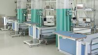 Empty beds in a hospital or surgical recovery room
