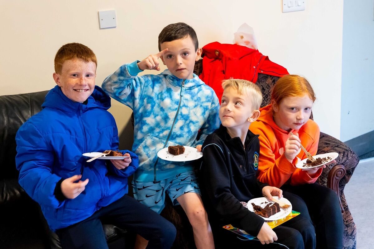 Local children Charlie, Conor, Patrick, and Mackenzie, in Knocknaheeny, Cork, at phase three of ‘I Can Colour Between The Lines, But I Choose Not To’.