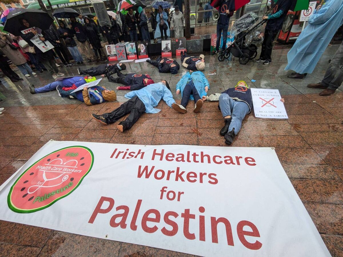 Healthcare workers held a 'Die In' in solidarity with their first responder colleagues during Saturday's pro Palestinian march. Picture: Cork Palestine Solidarity Campaign. Healthcare workers held a 'Die In' in solidarity with their first responder colleagues during Saturday's pro Palestinian march. Picture: Cork Palestine Solidarity Campaign.