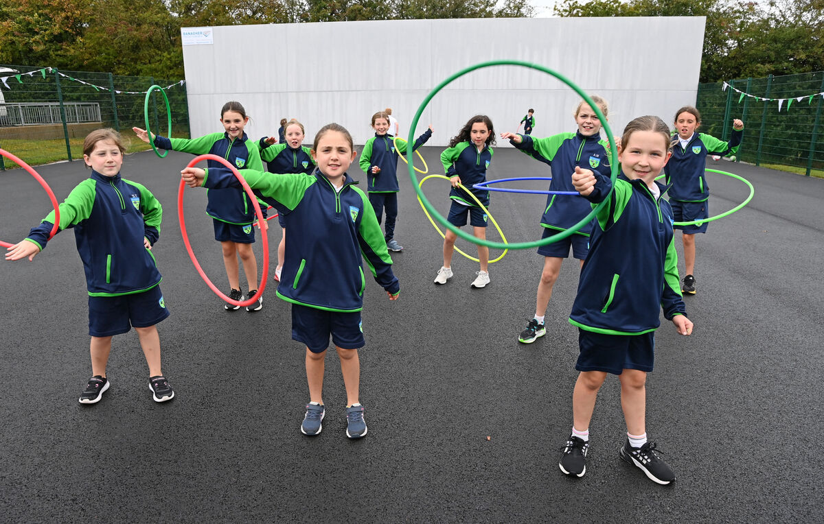Pupils enjoying the new playground at Aghabullogue national school during the blessing and formal opening of the new classroom and playing facilities at the school. Picture: Eddie O'Hare Pupils enjoying the new playground at Aghabullogue national school during the blessing and formal opening of the new classroom and playing facilities at the school. Picture: Eddie O'Hare