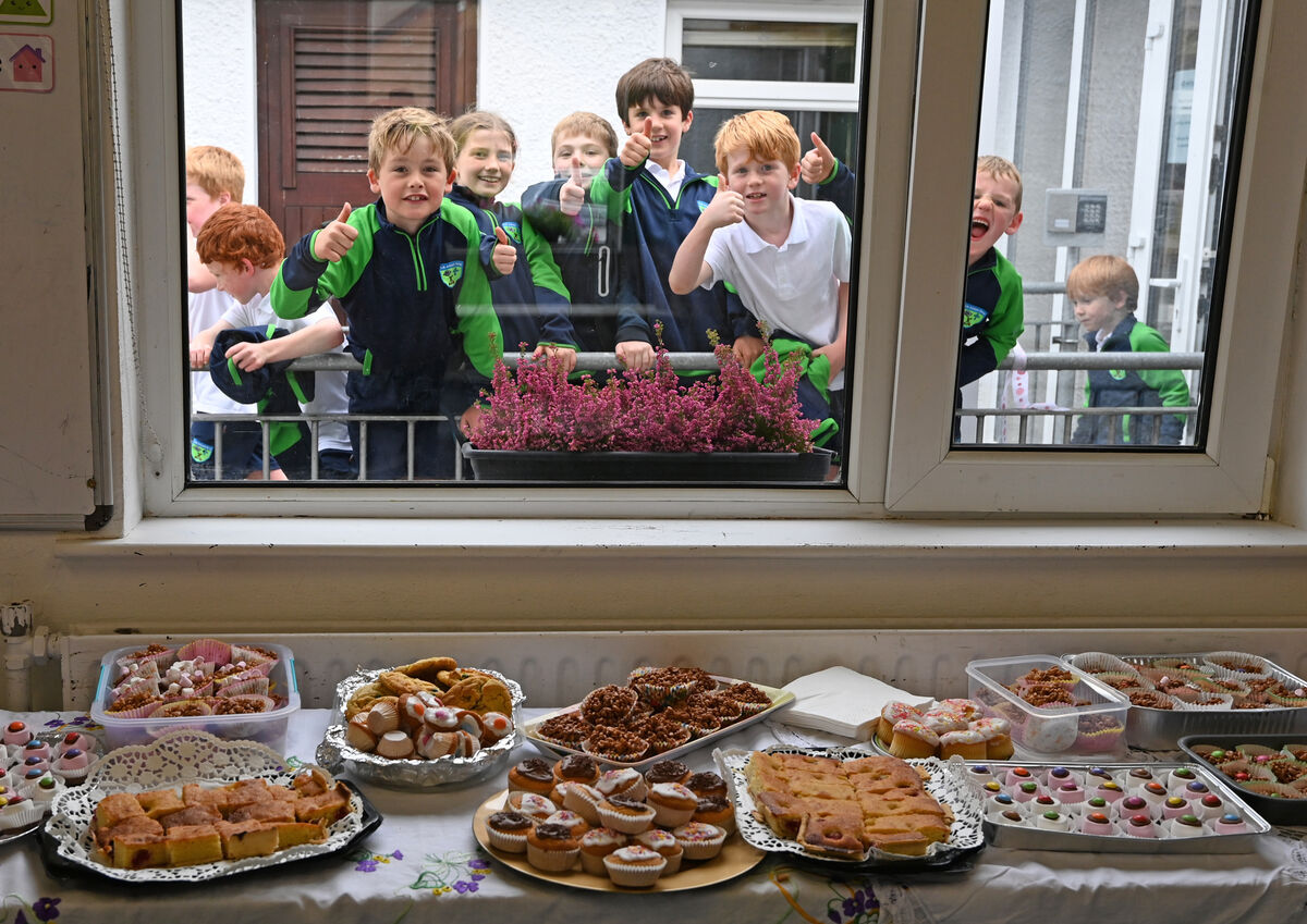 Pupils waiting outside for the lovely treats at Aghabullogue national school during the blessing and formal opening of the new classroom and playing facilities at the school. Picture: Eddie O'Hare. Pupils waiting outside for the lovely treats at Aghabullogue national school during the blessing and formal opening of the new classroom and playing facilities at the school. Picture: Eddie O'Hare.