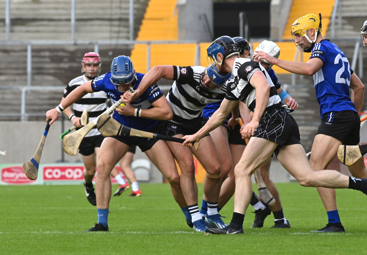 Paul Leopold of Sarsfields winning the ball from Midleton players Conor Lehane and Mikey Finn. Picture: Dan Linehan Paul Leopold of Sarsfields winning the ball from Midleton players Conor Lehane and Mikey Finn. Picture: Dan Linehan