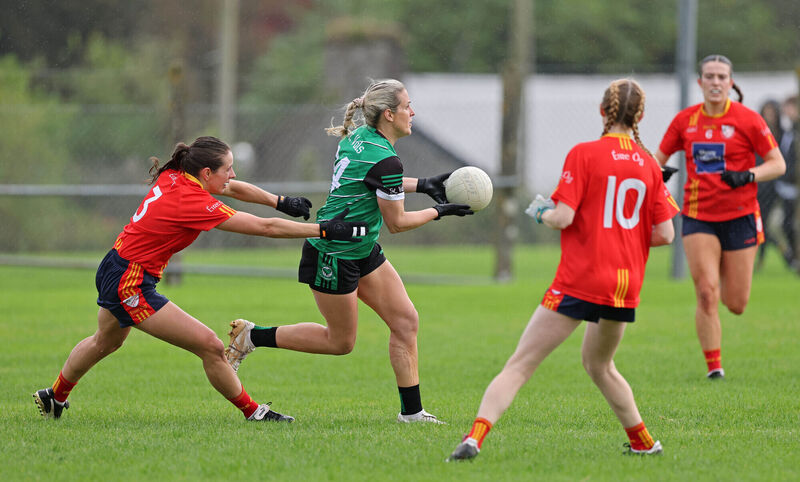 Bríd Stack, St Val's, takes on Jennifer O'Gorman, Éire Óg. Picture: Jim Coughlan.