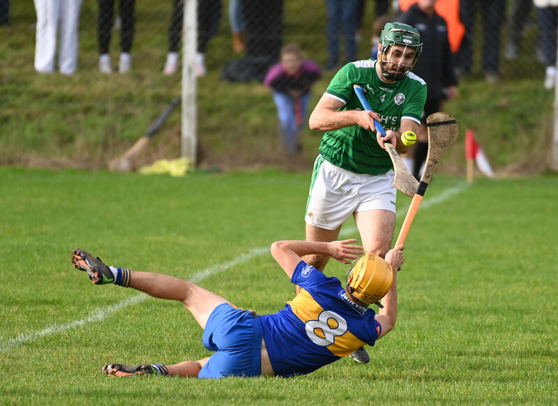 Ballincollig's Colin Moore is tackled by Carrigaline's Ronan Kelleher. Picture: Eddie O'Hare Ballincollig's Colin Moore is tackled by Carrigaline's Ronan Kelleher. Picture: Eddie O'Hare