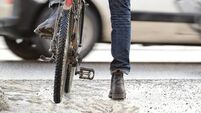Bike in traffic, winter