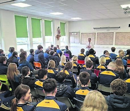 Minister of State Colm Burke spoke to students at Coláiste Éamann Rís recently about the