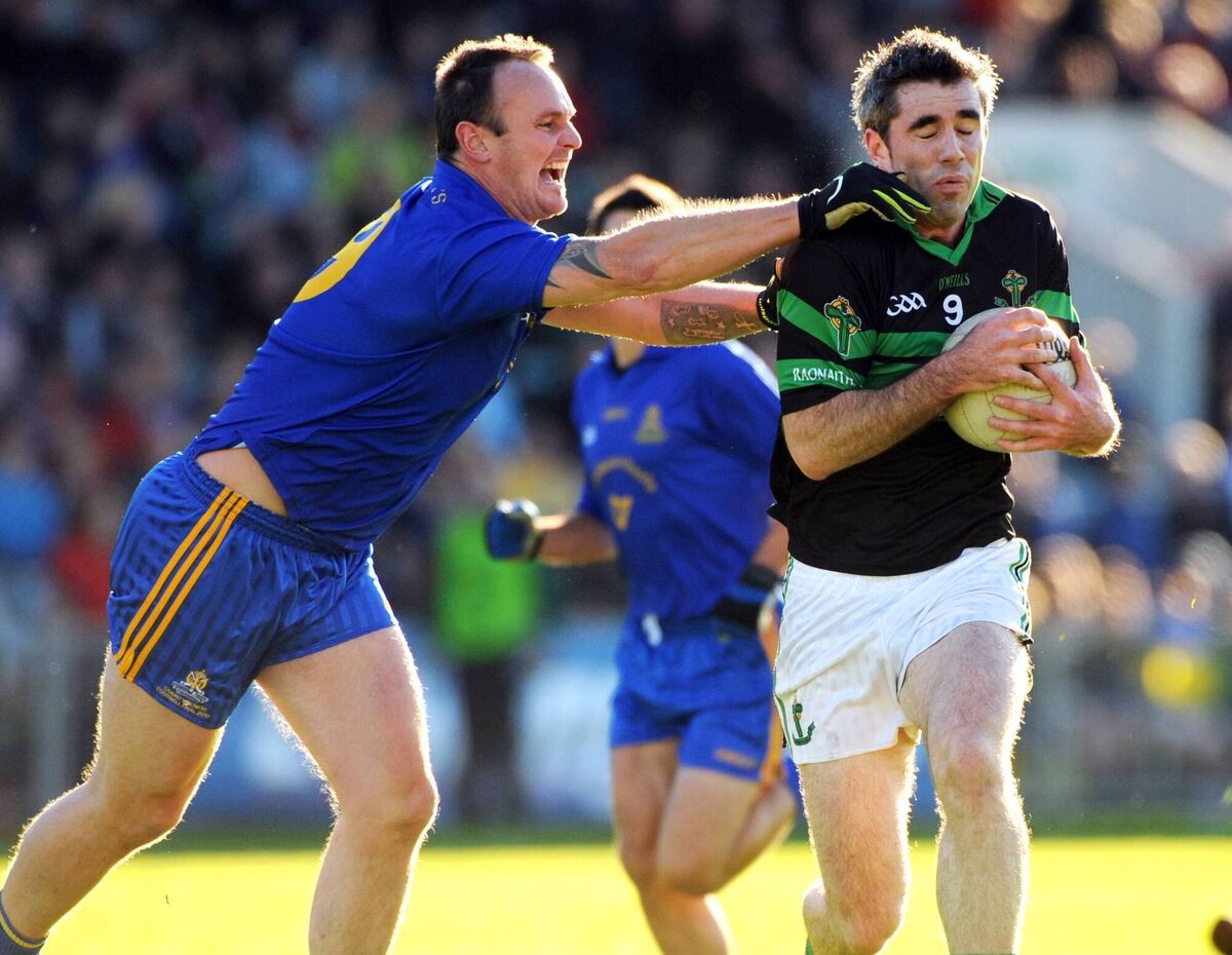 Nemo Rangers' David Niblock is tackled by St Finbarr's Aidan O'Shea in the 2010 final. Picture: Eddie O'Hare