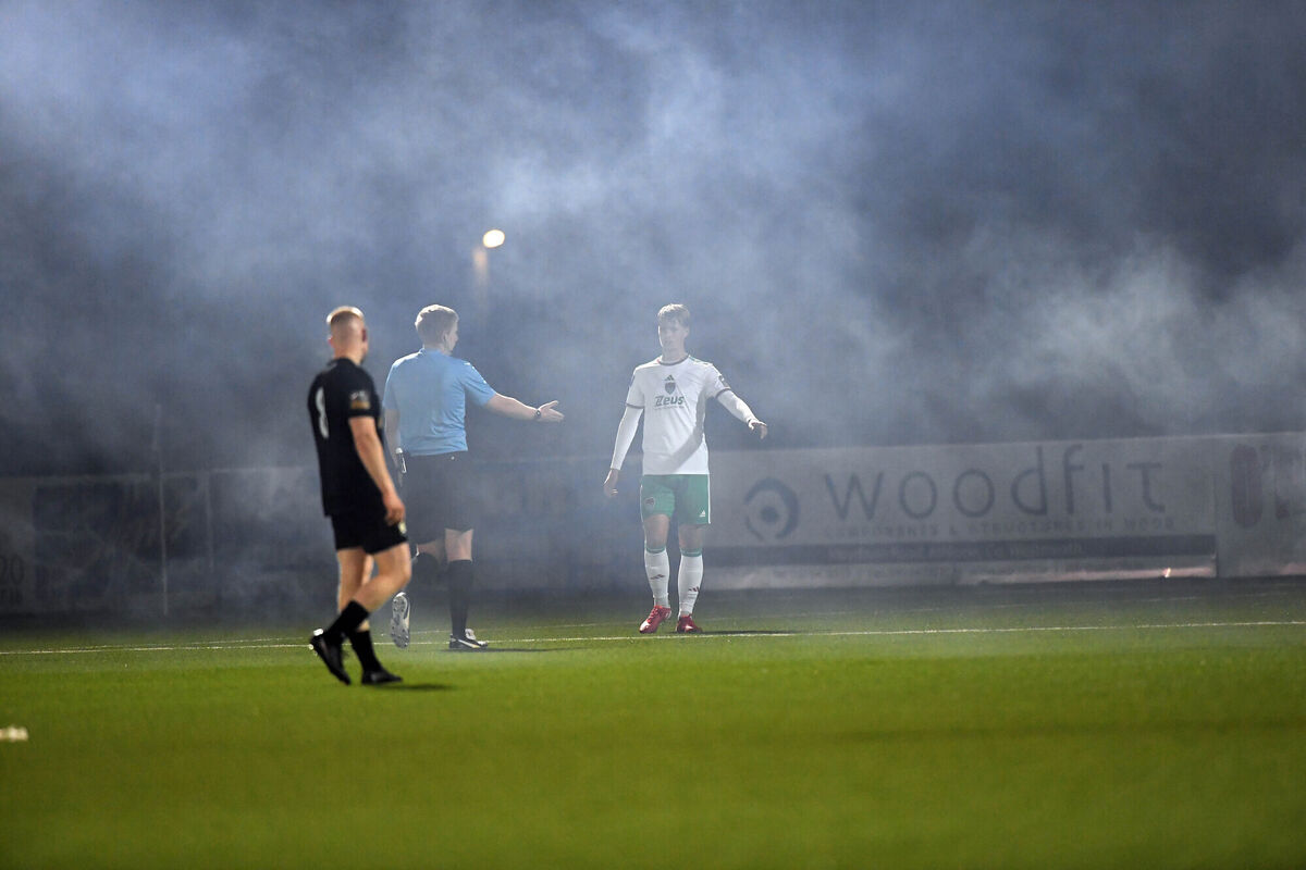 Referee Daniel Murphy calls for the ball after fireworks went off at Athlone Town Stadium, which led to a temporary halt. Picture: Ray Ryan Referee Daniel Murphy calls for the ball after fireworks went off at Athlone Town Stadium, which led to a temporary halt. Picture: Ray Ryan