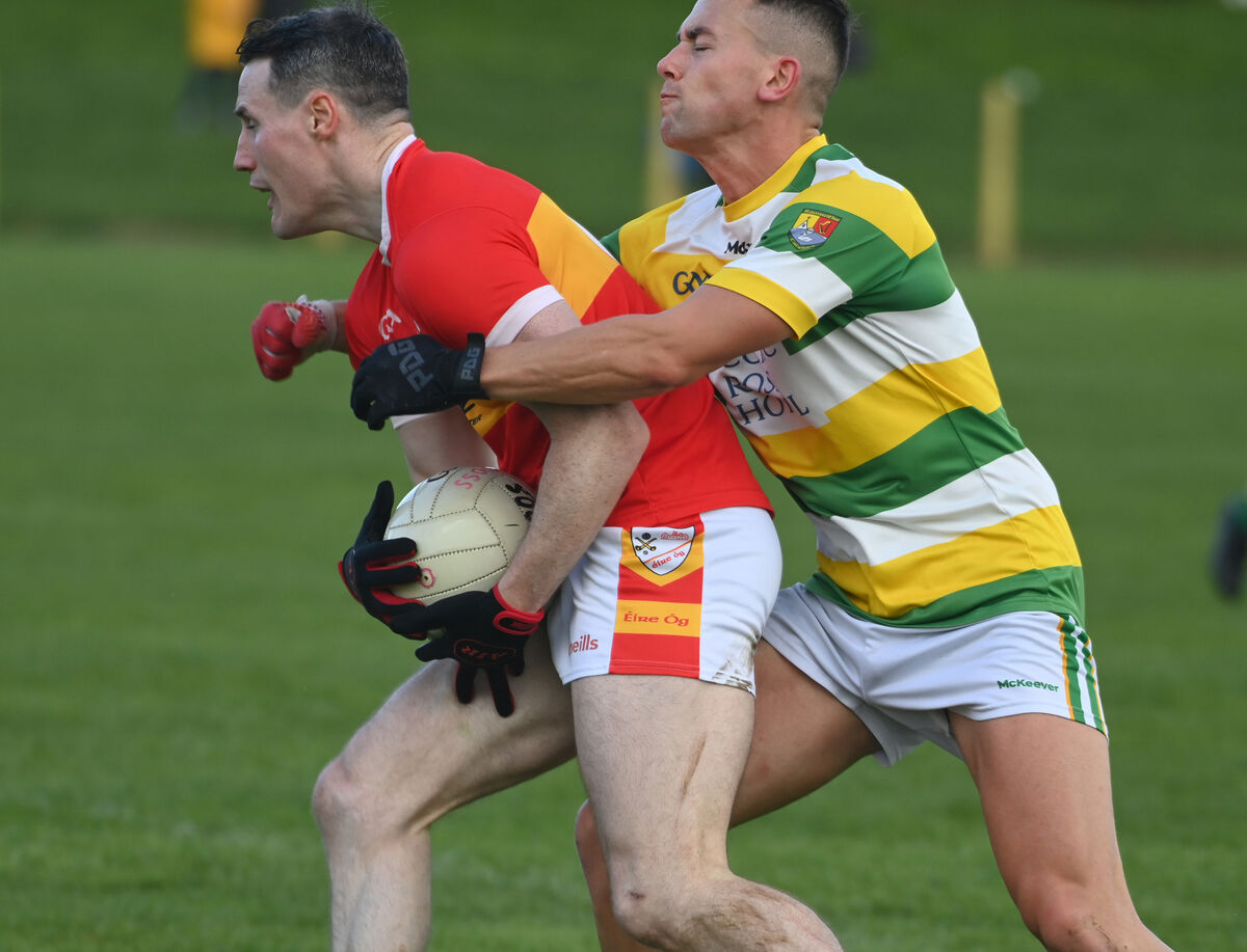 Éire Óg's Mark Griffin is tackled by Carbery Rangers' John Hodnett. Picture: Eddie O'Hare