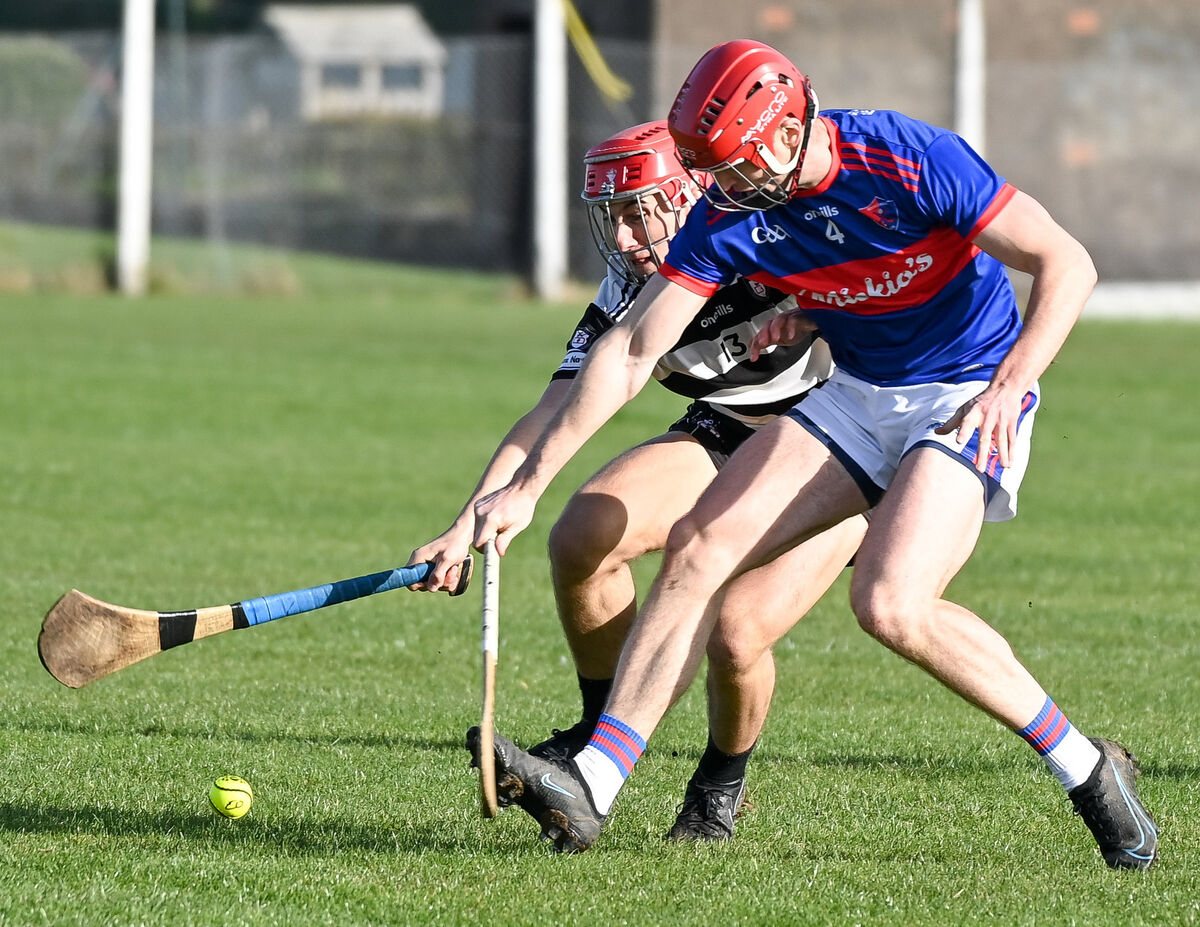  Midleton's Tiernan Roche and Alan Moynihan of Erin's Own, battle for the sliotar. Picture: David Keane.