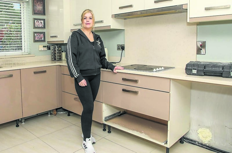 Aisling McEvoy in the kitchen of her water damaged home at Copper Valley Vue, Glanmire last December. Picture: David Creedon