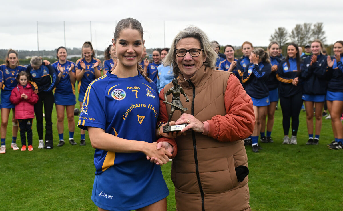 Aoife O'Neill, St Finbarr's is presented with The Echo-sponsored Player of the Match trophy from Mary Newman. Picture: Dan Linehan Aoife O'Neill, St Finbarr's is presented with The Echo-sponsored Player of the Match trophy from Mary Newman. Picture: Dan Linehan