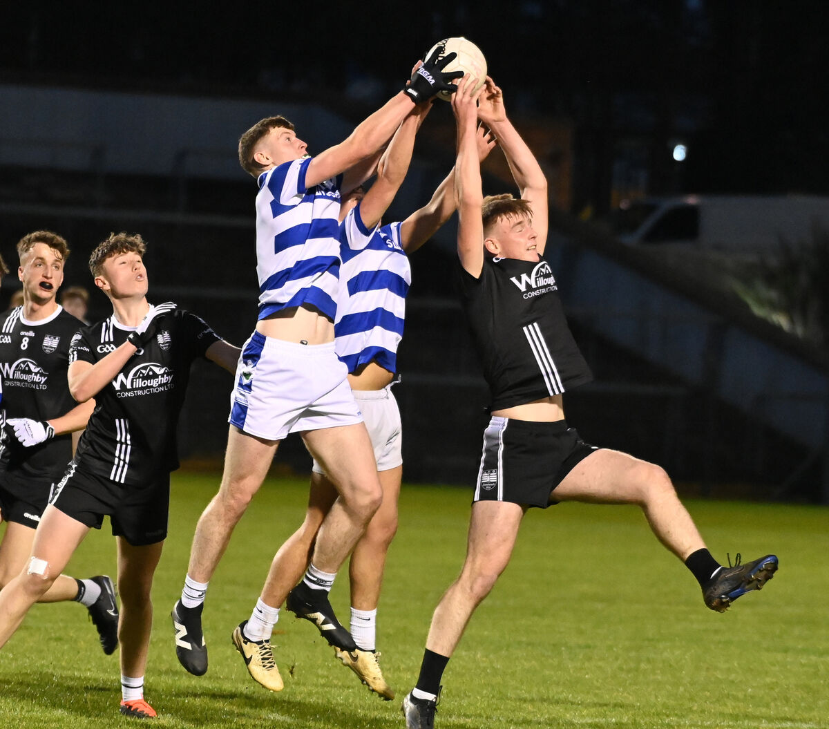Castlehaven's Cillian French and William O'Donovan go high with Donoughmore's Liam O'Sullivan during the Rebel Óg Premier 2 MFC final at Pairc Ui Rinn. Picture: Eddie O'Hare