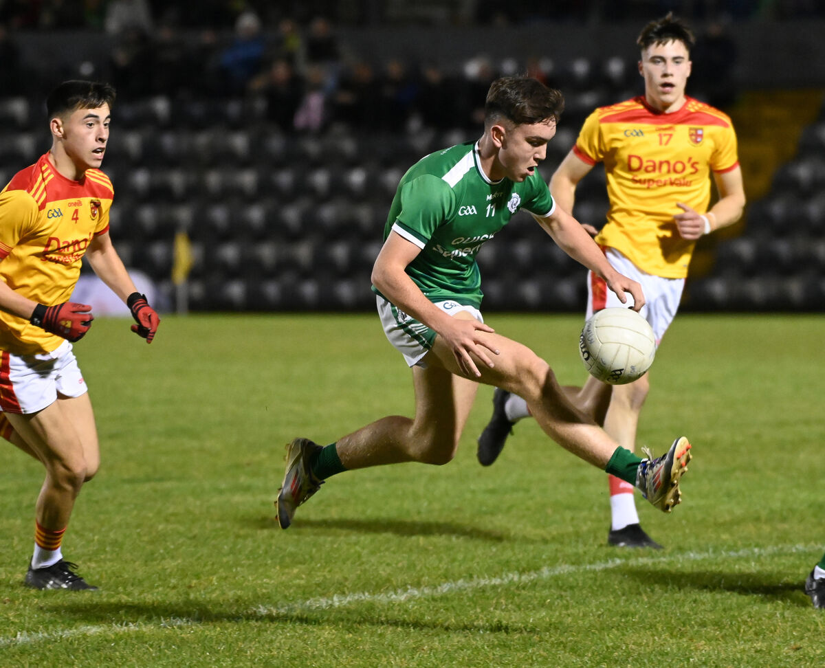 Ballincollig's Danny Miskella goes past Mallow's Paddy Murphy and John Murphy during the Rebel Óg Premier 1 MFC final at Páirc Uí Rinn. Picture: Eddie O'Hare