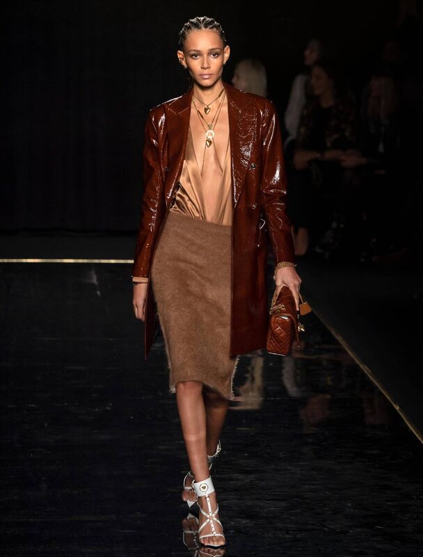 This is a stock image of Versace showcased a mix of rich browns in their autumnwinter runway.
