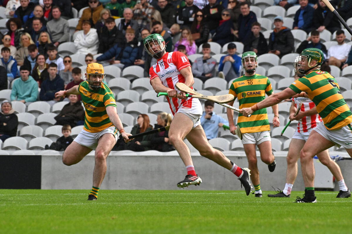 Imokilly's Séamus Harnedy gets the ball away despite the pressure of Blackrock duo Kevin O'Keeffe and Cathal Cormack. Picture: Dan Linehan