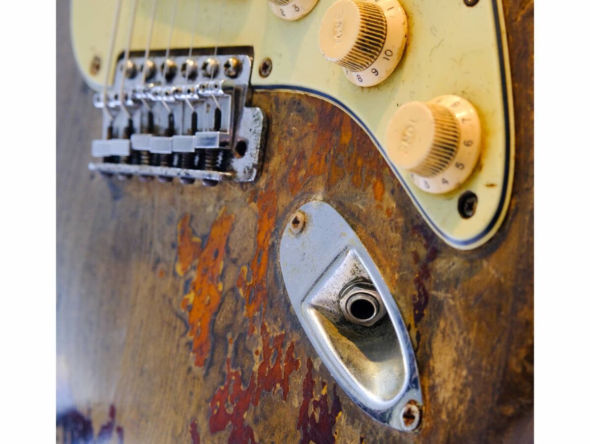 Study of Rory Gallagher's 1961 Sunburst Fender Stratocaster, which is due to be auctioned at Bonham’s in London today. Picture by BoB Dixon. Study of Rory Gallagher's 1961 Sunburst Fender Stratocaster, which is due to be auctioned at Bonham’s in London today. Picture by BoB Dixon.