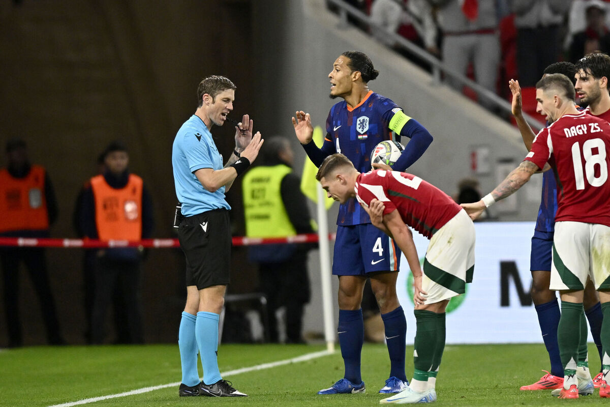 Virgil van Dijk of the Netherlands argues with Referee Lukas Faehndrich after he showed him a second yellow card during the Nations League soccer match between Hungary. Picture: AP Photo/Denes Erdos