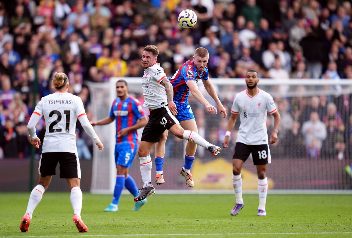 Liverpool's Alexis Mac Allister and Crystal Palace's Adam Wharton (right) battle for the ball in the air during the Premier League match at Selhurst Park, London. Picture: Adam Davy/PA Wire