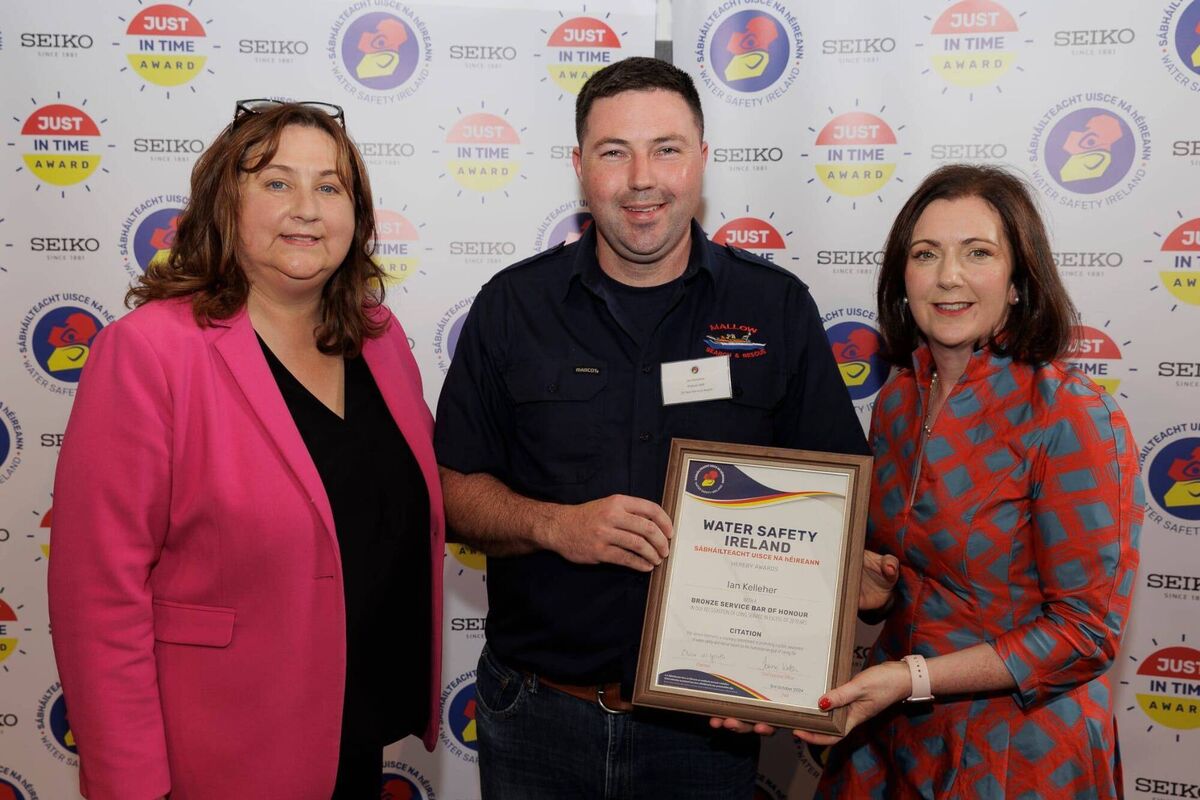 Ian Kelleher, of Mallow Search and Rescue, receives his award from Minister Anne Rabbitte and Clare McGrath, Chairperson, Water Safety Ireland Ian Kelleher, of Mallow Search and Rescue, receives his award from Minister Anne Rabbitte and Clare McGrath, Chairperson, Water Safety Ireland