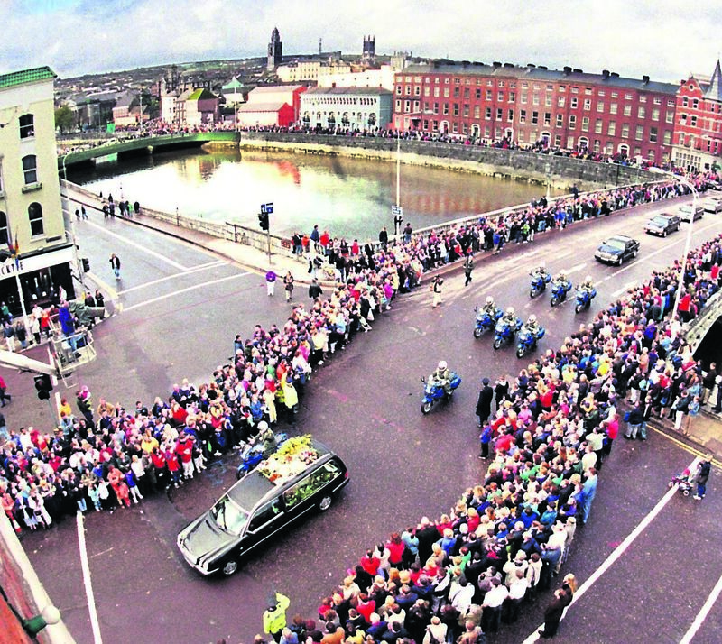 FAVOURITE SON: Some of the crowds watching the funeral cortege of Jack Lynch (inset) pass over St Patrick’s Bridge in October, 1999