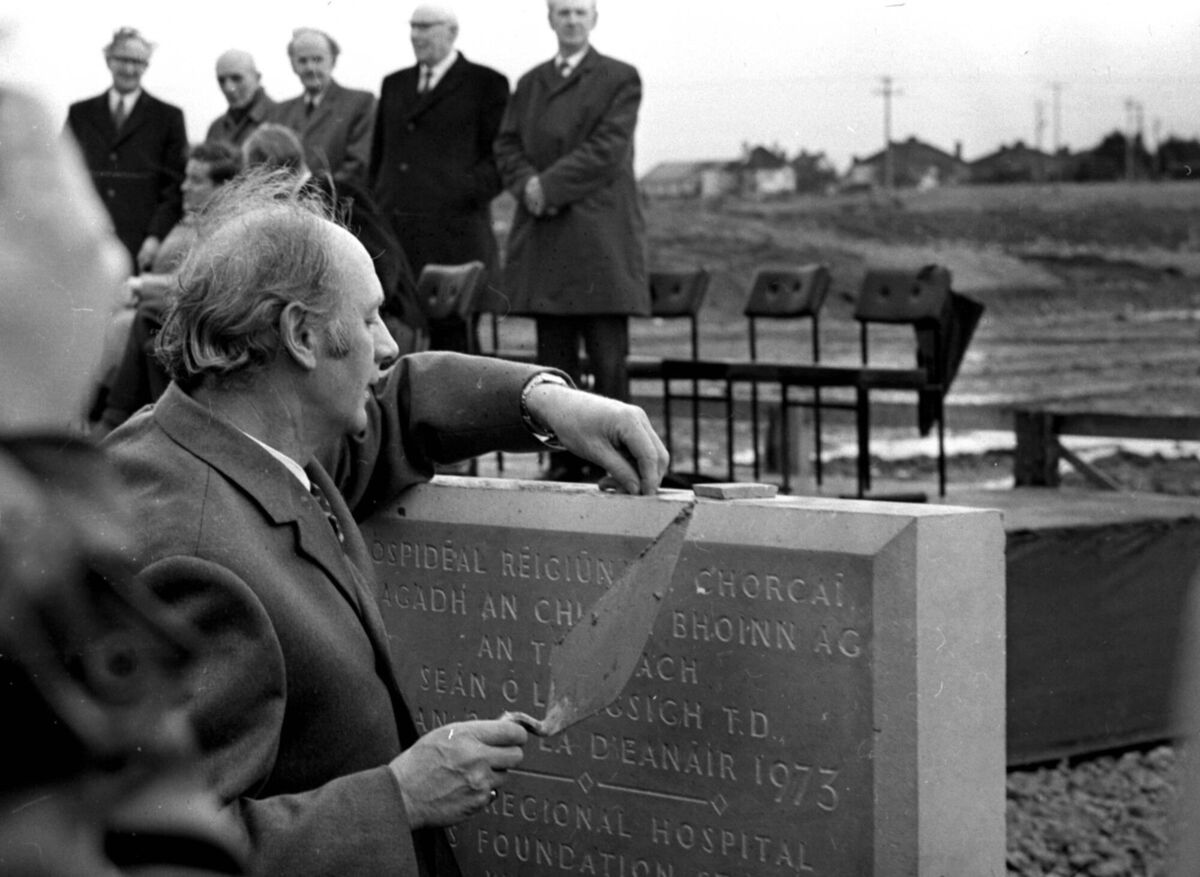 Then-taoiseach Jack Lynch placing coins within the foundation stone of the new Regional Hospital at Wilton, Cork 1973. Picture: Irish Examiner Archive /black and white Then-taoiseach Jack Lynch placing coins within the foundation stone of the new Regional Hospital at Wilton, Cork 1973. Picture: Irish Examiner Archive /black and white