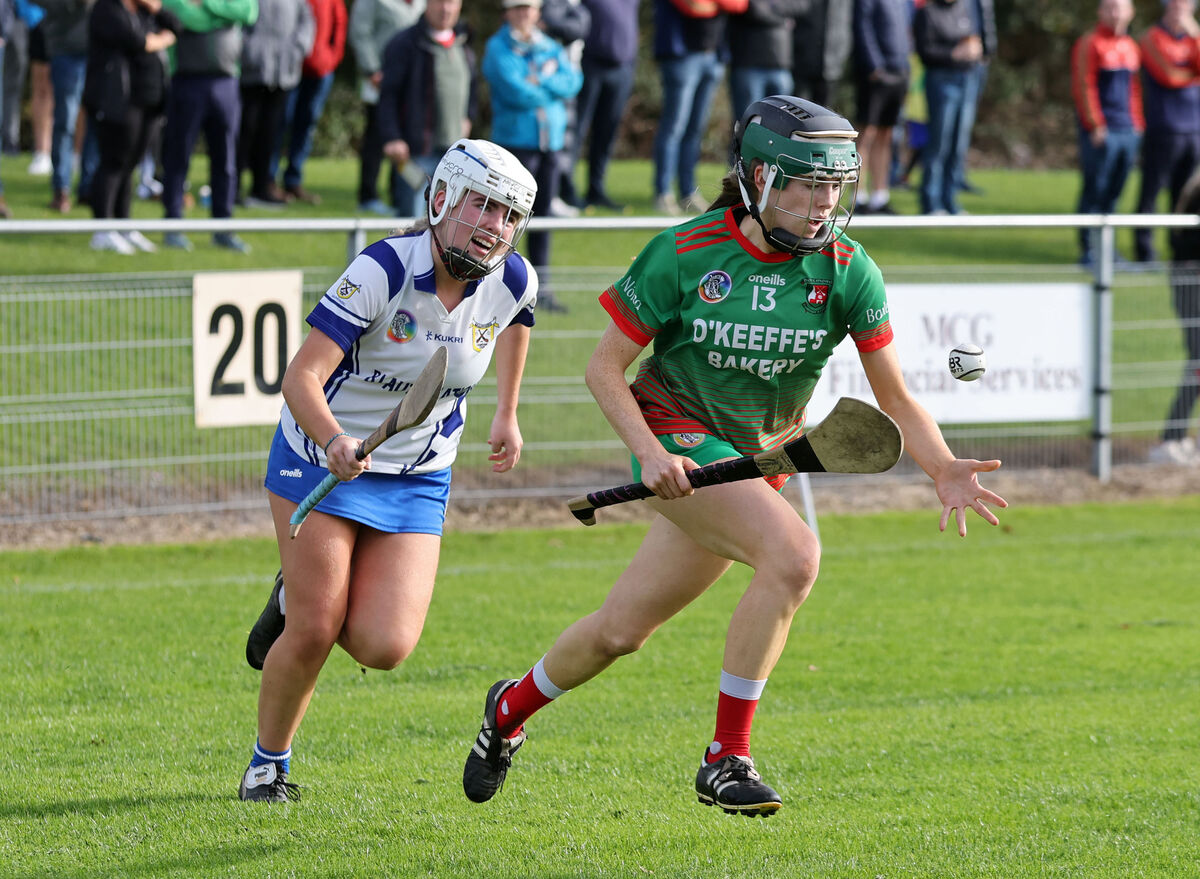  Kate Dooley, Ballinora, takes on Millie O'Rourke, Ballinhassig. Picture: Jim Coughlan.