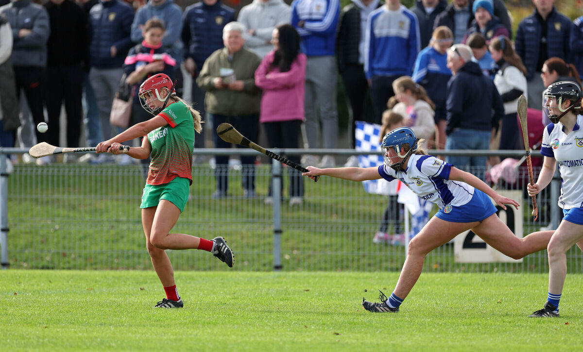  Louise O'Neill, Ballinora, shoots from Millie Lombard and Shonagh Whyte, Ballinhassig. Picture: Jim Coughlan.