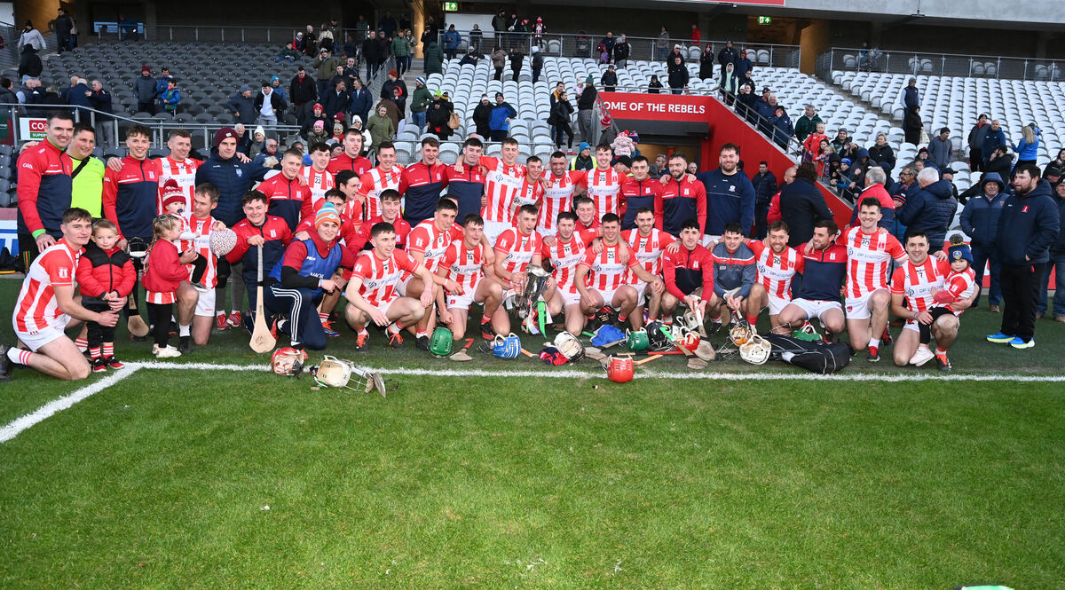Imokilly players celebrate with the Sean Óg Murphy Cup after defeating Sarsfields. Picture: Eddie O'Hare