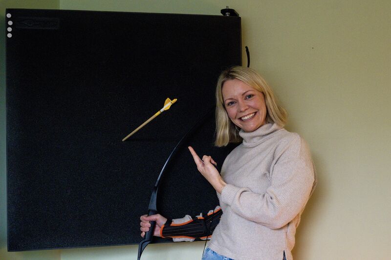  Emer Harrington celebrates the bullseye she got with her first arrow during her indoor archery class. Picture; Chani Anderson